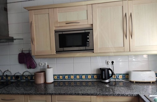 Budens House | Luxury house, 4 people, 2 bedrooms. Shared swimming pool. Golf nearby
