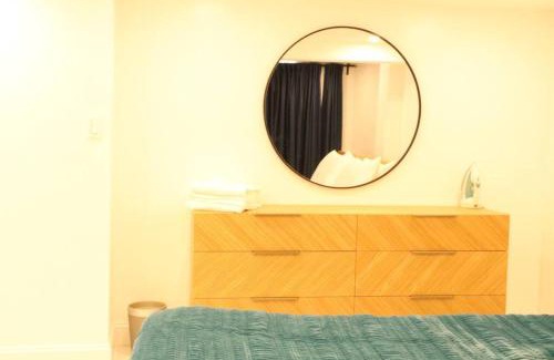 Schenectady Apartment | Luxury king bed parking & washer