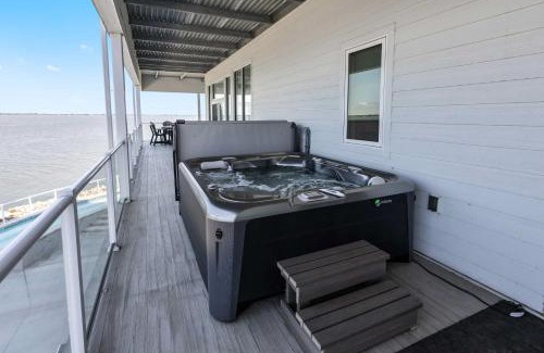 Watertown Apartment | Luxury Lakefront Condo with Private Hot Tub and Sauna