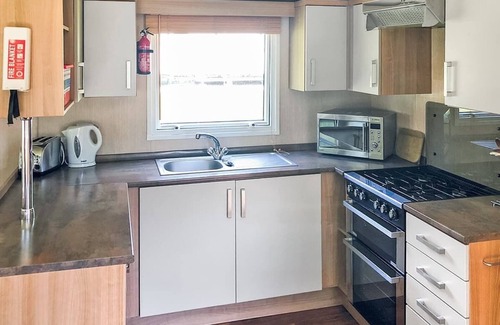 Saint Ann's Chapel House | Luxury modern and spacious 12ft-wide caravan with one double and two twin.