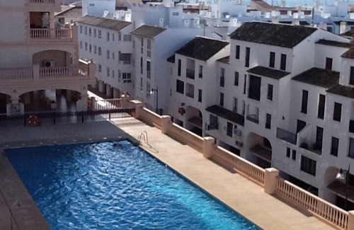 Almerimar Apartment | Luxury penthouse overlooking the golf course of Almerimar.