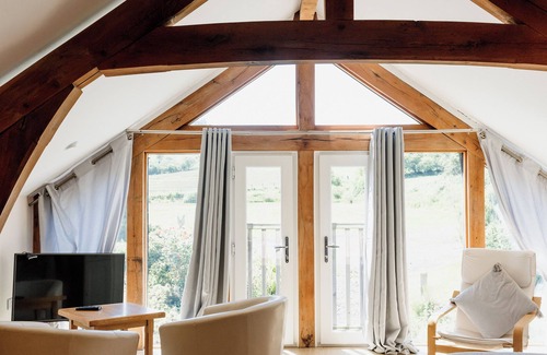 Devils Bridge House | Luxury renovated barn + countryside farmhouse with large hot tub sleeping 50