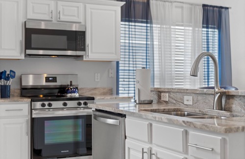 Sunrise Lakes House | Luxury Stay Near Disney Private Pool Hot Tub & EV Charger at Blissful Blue Oasis