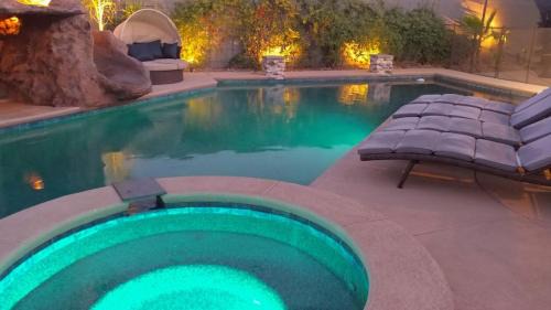 Canyon Gate Villa | Luxury Villa, with bonus pool house, Private Pool, Hot tub, rock water fall and slide, putting green, basketball, shuffle board, play gym, privately gated on circular driveway.