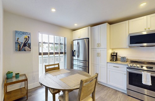 Marco Island Condo | Luxury waterfront condo with shared pool, hot tub, and a tennis court