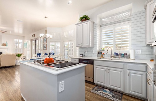 Val Vista Lakes House | Luxury Waterfront Home w/GAME ROOM & HEATED POOL