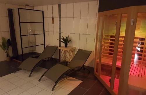 Tzummarum Villa | Luxus Familienvilla mit Jacuzzi & Sauna