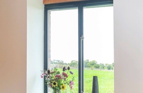 West Compton Cottage | Lynchets - a semi-detached converted barn that sleeps 4 guests in 2 bedrooms