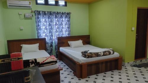 Jorhat Hotel | Maa Sumthira Lodge