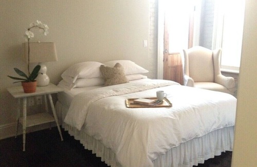 Faubourg Lafayette Bed & Breakfast | Magazine Street Balcony + History & Style