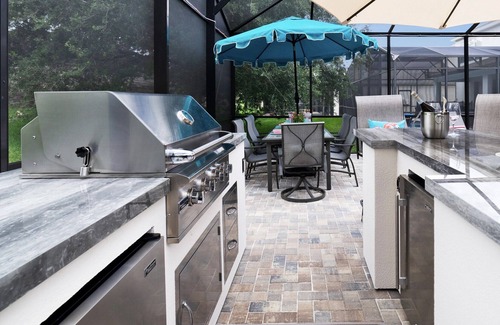 Windsor Hills House | Magical 5 bedroom villa, extended pool deck and movie theatre room near Disney