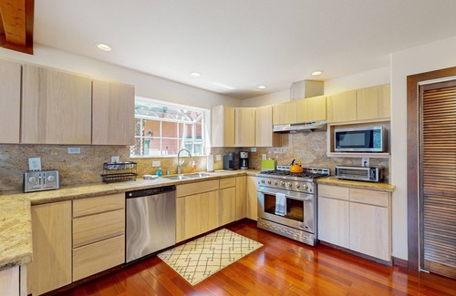 Cleone House | Magical estate & detached guest suite with hot tub, game room, pond & playset
