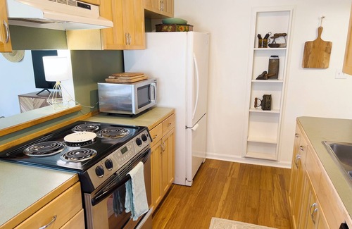 Magnolia House | Magnolia Garden Cottage - a tranquil retreat surrounded by gardens
