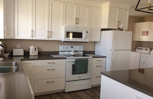 Cheticamp House | Main Floor (Unit 1) in House, Deck, Sunset, Water View (Cheticamp Harbour)