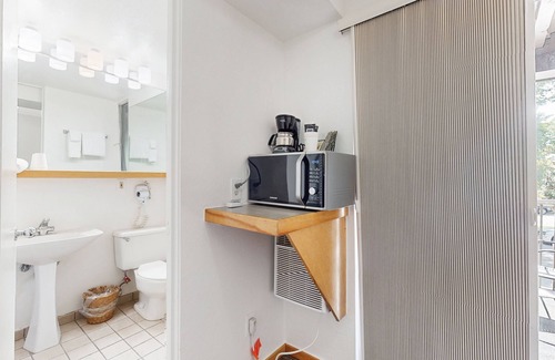 West End Cabin | Main St. room - pool & hot tub - walk to lifts, dog-friendly, balcony