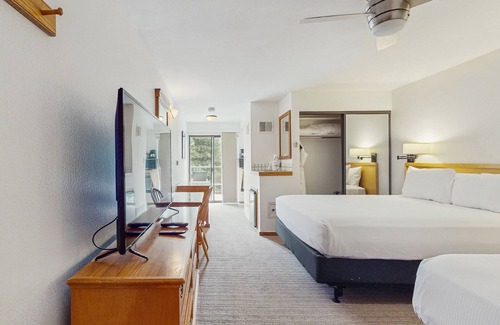 West End Cabin | Main Street stay - pool & hot tub - walk to lifts, dog-friendly, balcony