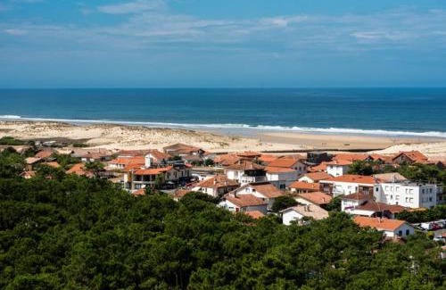 Lit-et-Mixe Villa | Maison en bois avec piscine proche de la plage
