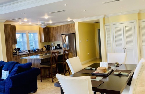 Cotton Ground Condo | “Mango” - Vibrant Condo Yards from BEACH at Hamilton Beach Villas & Spa