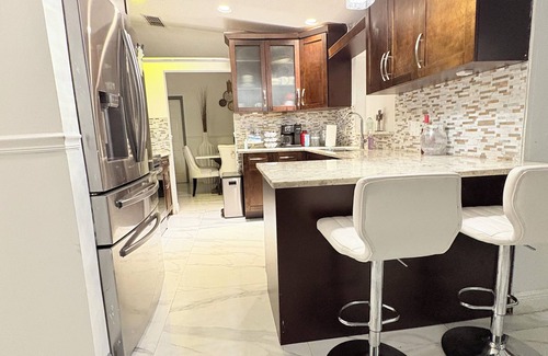 Margate House | Master Bedroom suite - Perfect for a getaway. Near CHASE Stadium