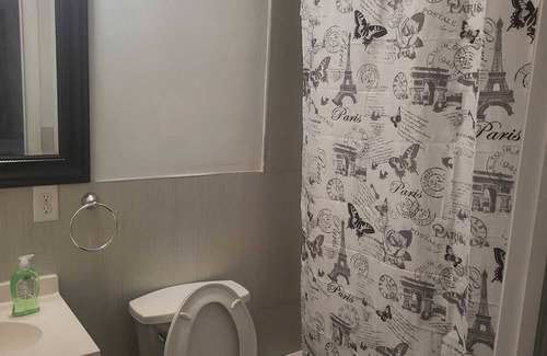 West Side Apartment | Master bedroom with bathroom. With Fridge, Mircowave . 50 Inch LCD, etc.