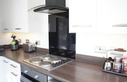 Broadheath Condo | Maya Boutique Inn - Garden - Sleeps 6