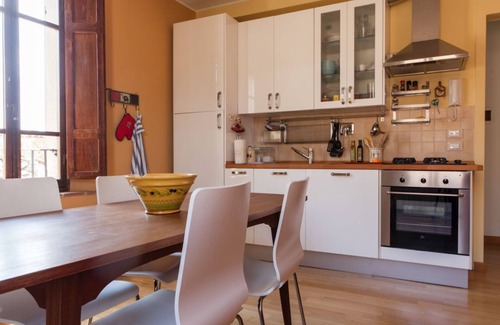 Compignano Apartment | Medieval village TOP flat, third floor with Wi-Fi & aircon