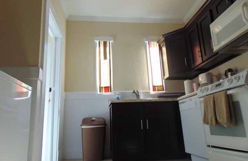 Anniston Apartment | MercyBungalow #2 with king sized bed and shower room