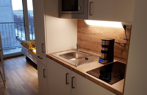 Riem Apartment | Micro apartment directly at the Messe München-Riem