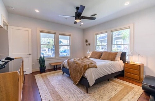 Woodland Heights House | mid-century bungalow + private retro studio with outdoor hot tub