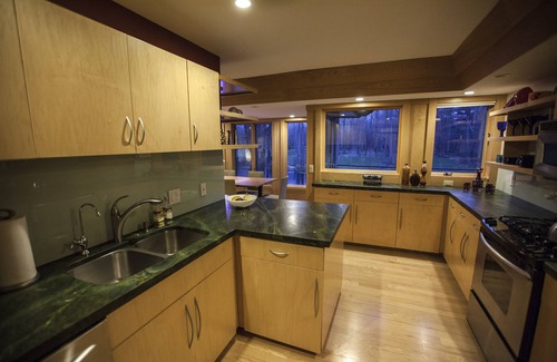 Midland House | Mid-Century Modern Retreat on Private 10 Acres with 1-Acre Pond & Nature Trails.