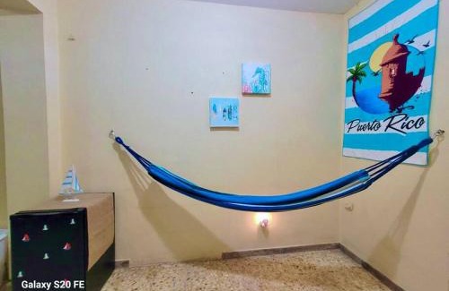 Gobernador Pinero Apartment | Mid-City Beach Apartment With Indoor LED Pool