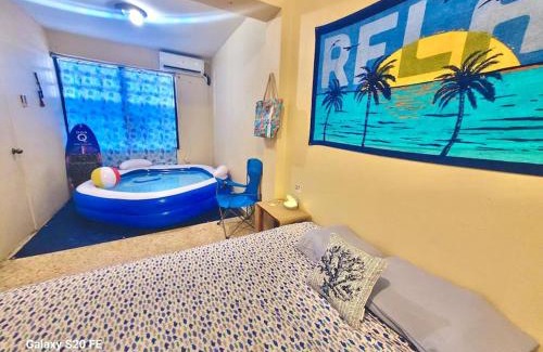 Gobernador Pinero Apartment | Mid-City Beach Apartment With Indoor LED Pool