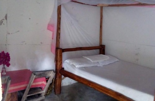 Gede Bed & Breakfast | Mida Creek Eco Camp - relax in cosy cottage