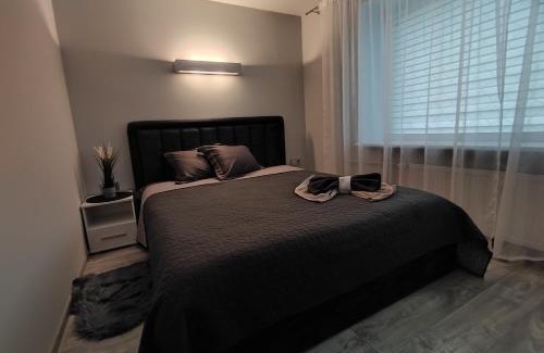 Telsiai Apartment | Miesto šviesų apartamentai Telšiuose