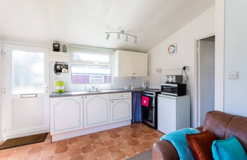 Llanybri Ski Chalet | Milkwood, A lovely Three-bedroomed chalet, sleeps five