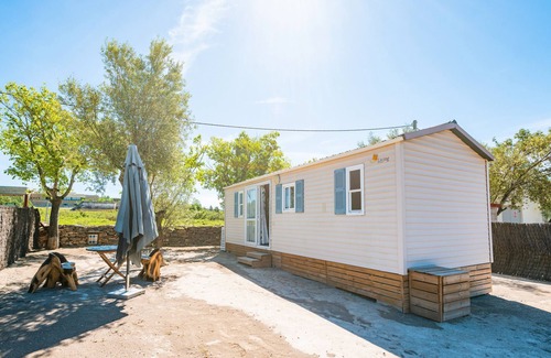 Tirig RV Rental | Mobile Home '243' with Mountain View, Wi-Fi and Air Conditioning