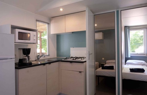 Portese House | Mobilehome with pool and slides