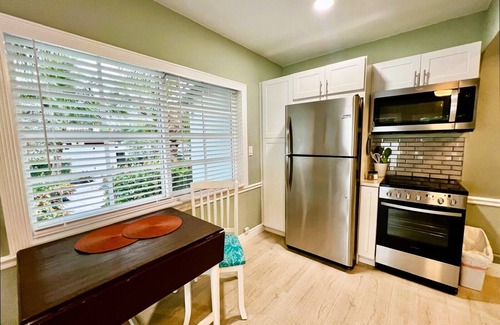 Parrot Cove Apartment | Modern 1 bedroom villa just five minutes to the beach!
