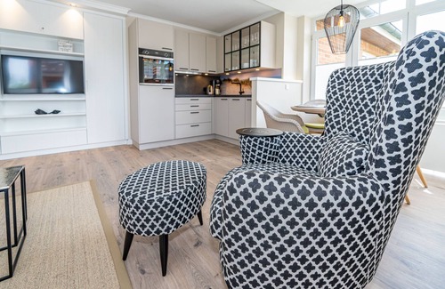 Wenningstedt-Braderup Apartment | Modern 2-room vacation apartment with balcony, by the village pond.