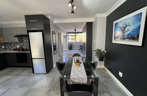 Pretoria Apartment | Modern 4 sleeper private suite and access to beautiful garden and swimming pool