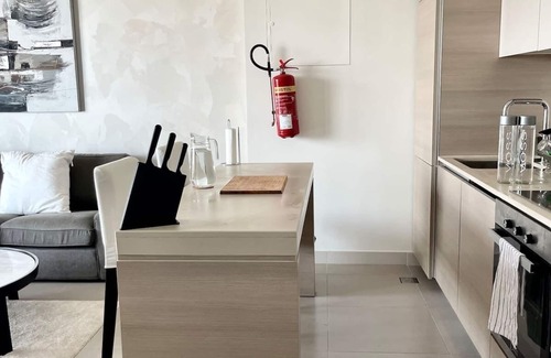 Muharraq Apartment | Modern apartment l Pool + Acess Marasi beach.