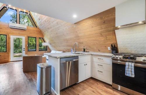 New Iberia Apartment | Modern A-Frame Cabin by Rip Van Winkle with Hot Tub