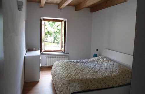 Terzo d'Aquileia Apartment | Modern apartment with wooden beams