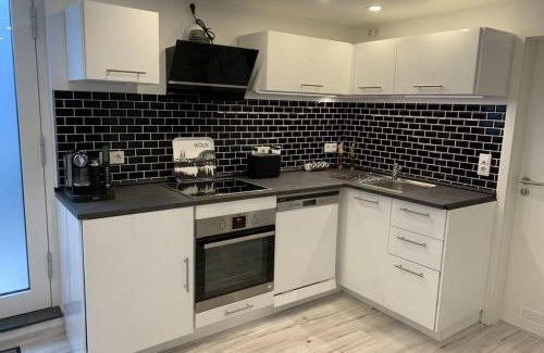 Putzchen/Bechlinghoven Apartment | Modern apartment especially suited for business consultants I close to DT, DHL & UN Campus I reserved parking & personal shuttle to UN campus on demand