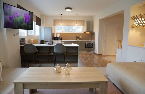 Maniakoi Apartment | Modern apartment with a lake view for a comfortable stay. Easy parking space