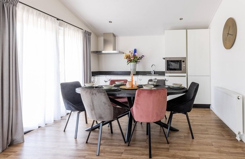 Municipality of Veldhoven Ski Chalet | Modern chalet on the water in the Brabant Kempen