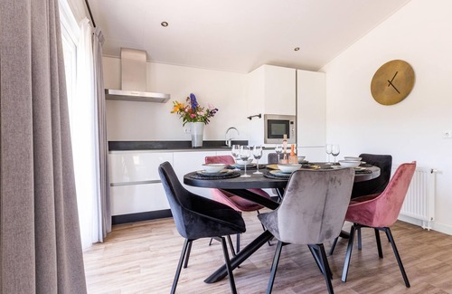 Municipality of Veldhoven Ski Chalet | Modern chalet on the water in the Brabant Kempen