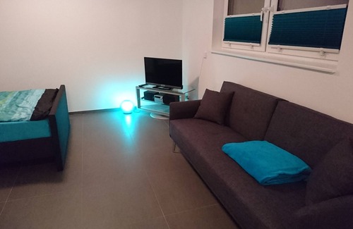 Wollbach Apartment | Modern & comfortable vacation apartment with own entrance, large balcony. Terrace & own PP