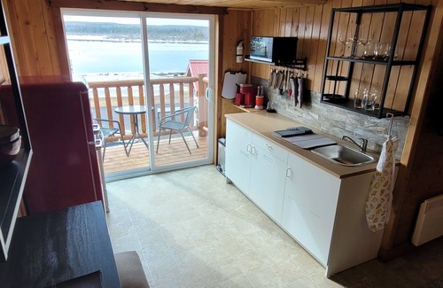 Acadian Peninsula Apartment | Modern Costa Del Sol Flat Overlooking Pokemouche River, with swimming off dock.n