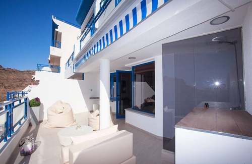 Taurito Apartment | Modern designer apartment with large terrace and sea view!